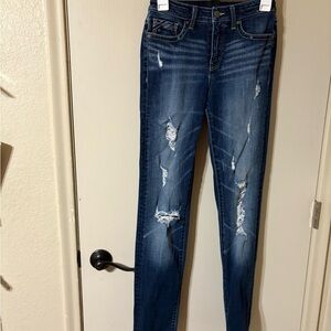 Buckle Blue Skinny Jeans with Distressed Detailing